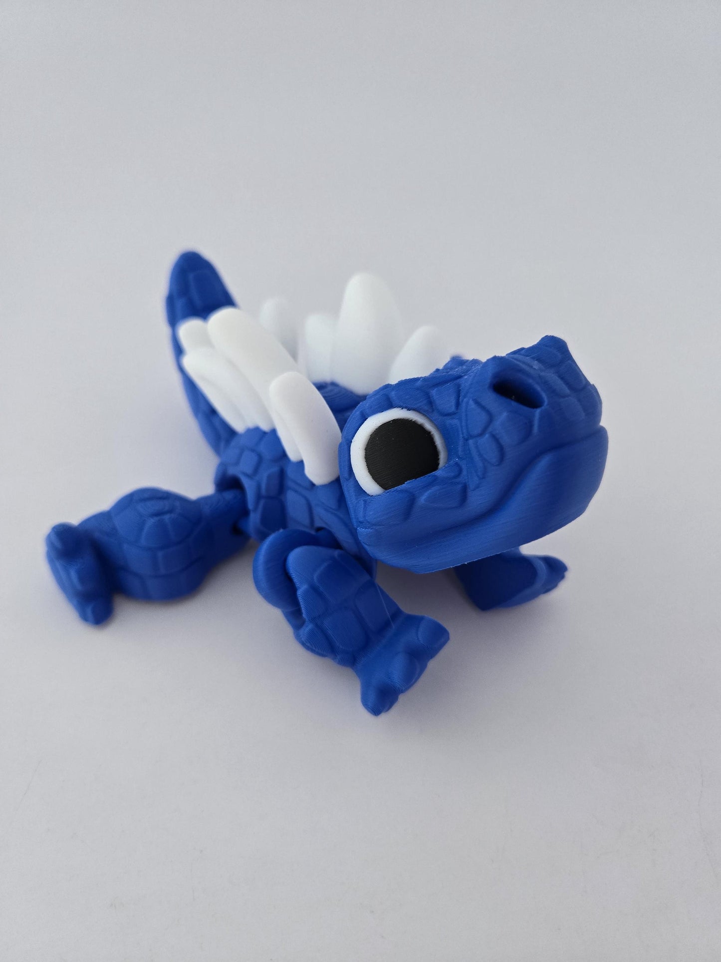 3D Printed Blue Stegosaurus with White Spikes