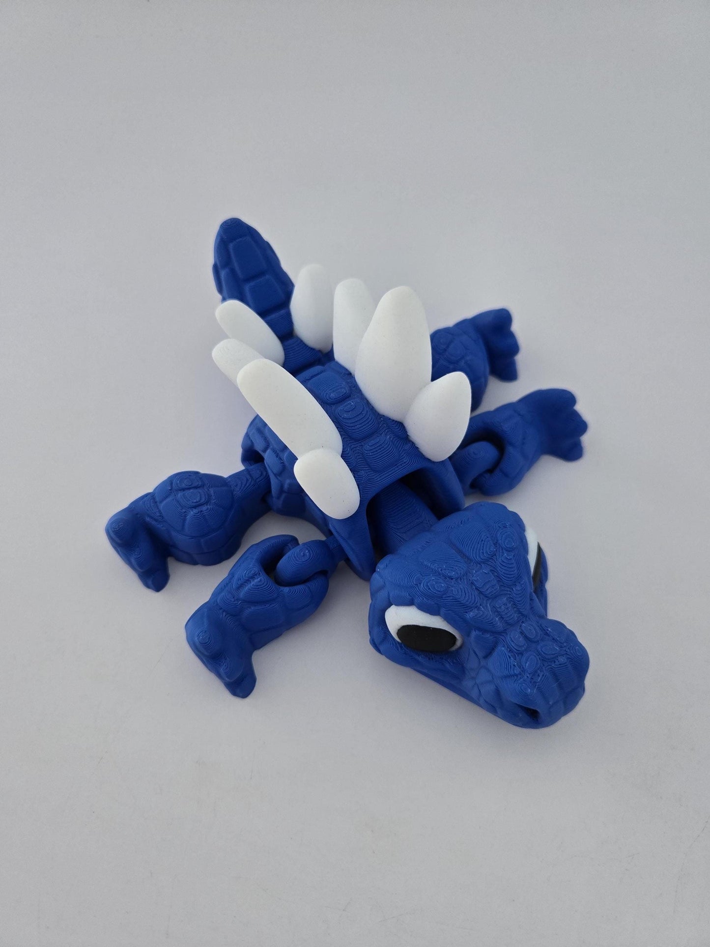 3D Printed Blue Stegosaurus with White Spikes