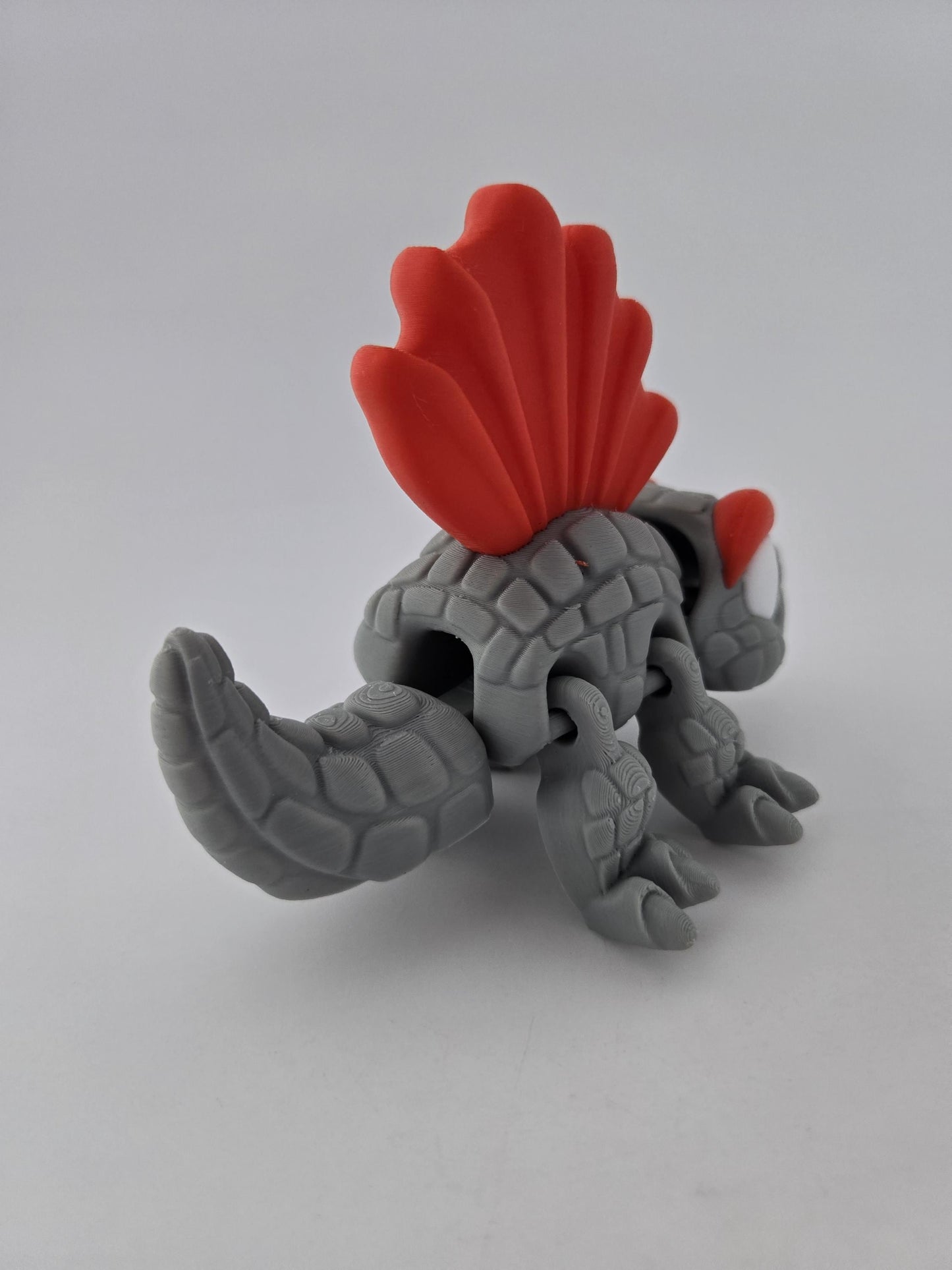 3D Printed Grey Dimetrodon with Red Fin