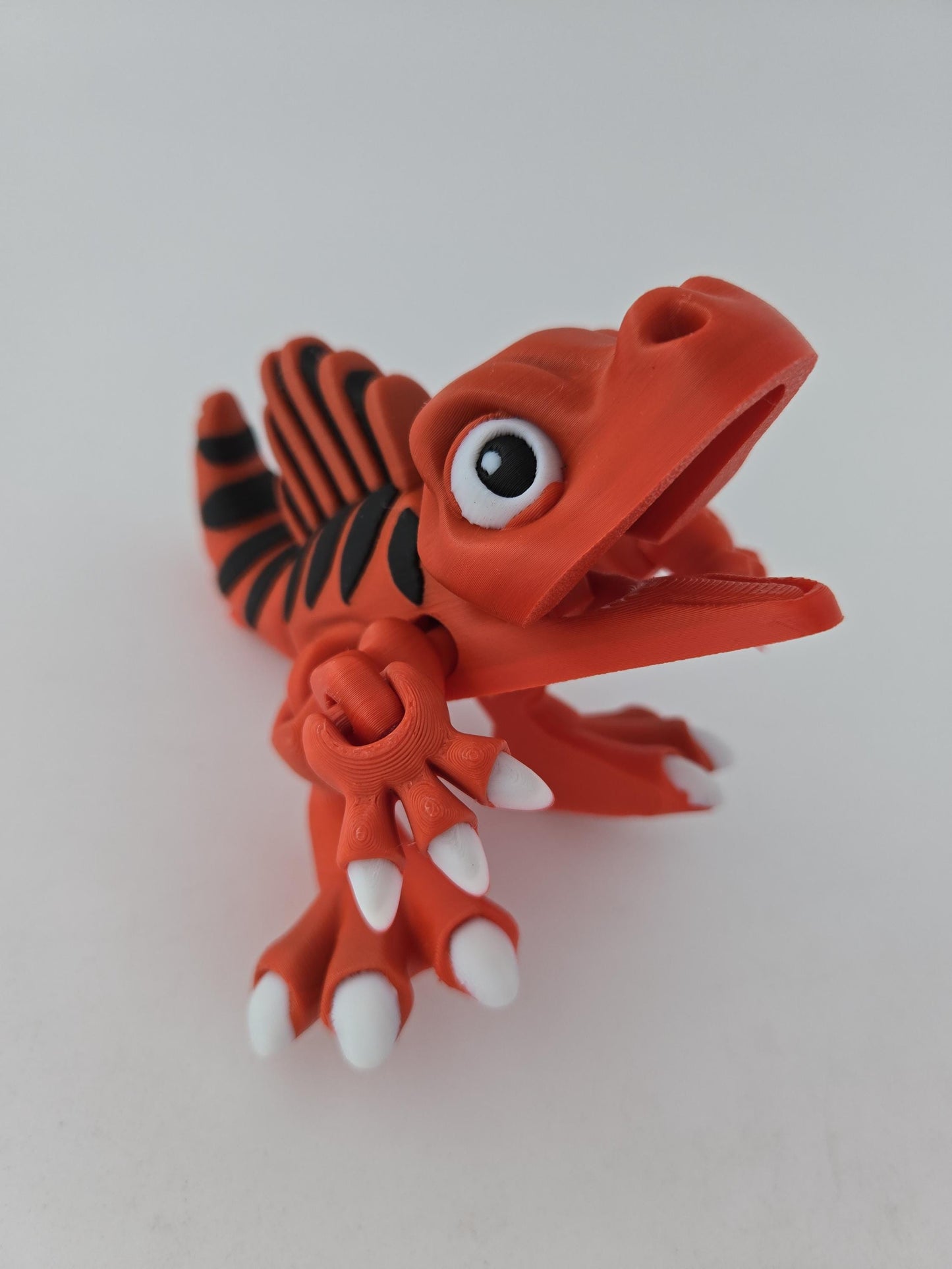 3D Printed Red Spinosaurus with Black and Red Fin